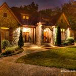 Front view of Waterfront property at night