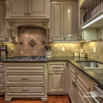 Granite workspaces throughout kitchen.